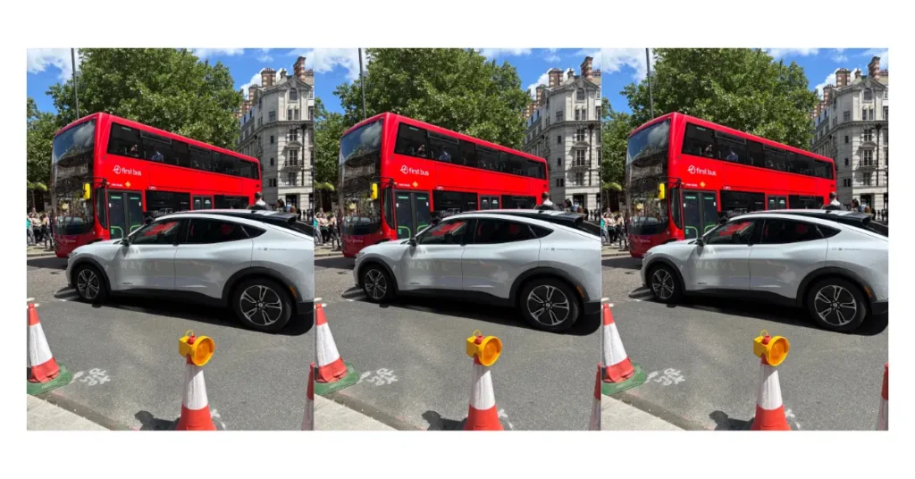 Self-driving car on a city road beside a London bus, used to prompt classroom discussion about future transport