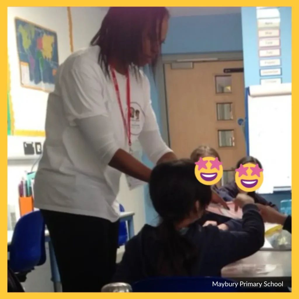 Beverly Clarke MBE leading an Ava and Chip author visit workshop with pupils at Maybury Primary School.